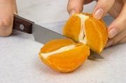 Приготовление блюда по рецепту - Апельсины с корицей. Шаг 2